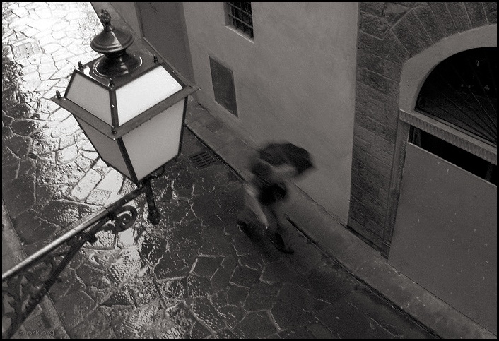 Smoking in the rain; Florence, Italy
